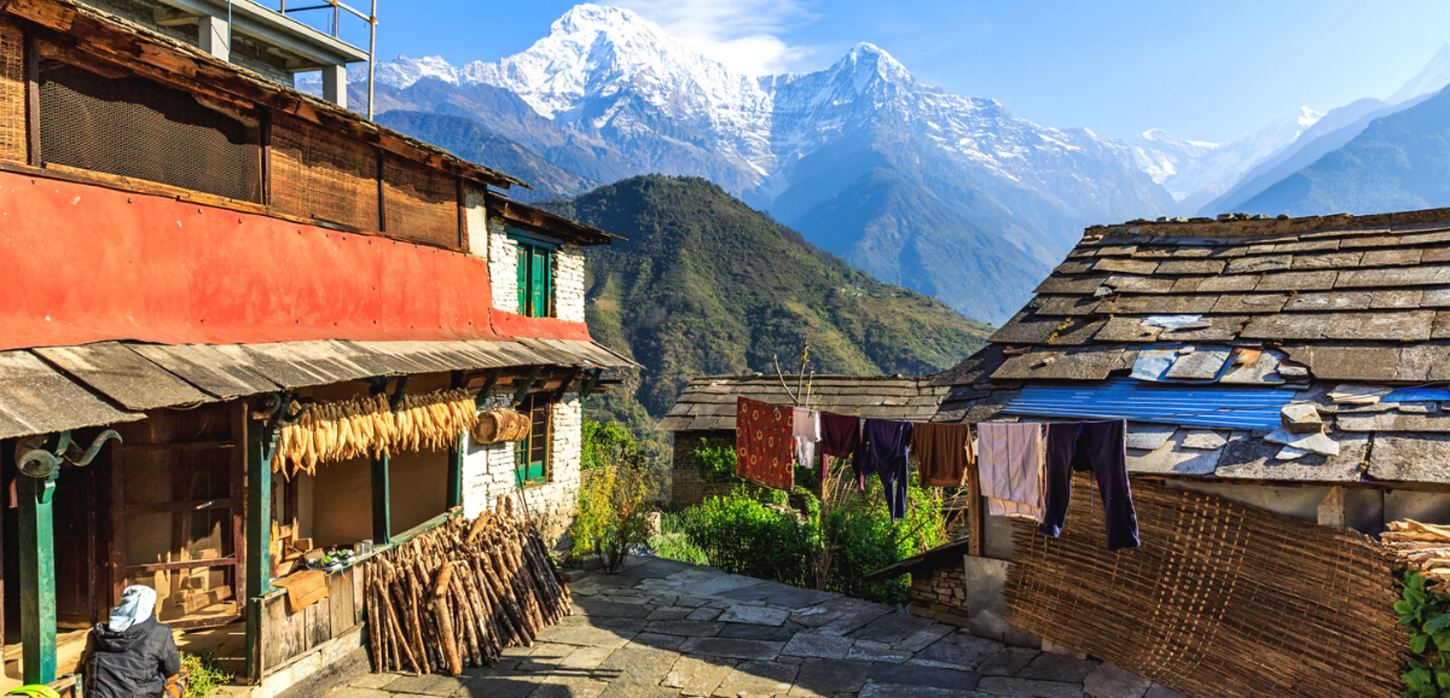 Et rejoignez Ghandruk, un village typique au pied des montagnes